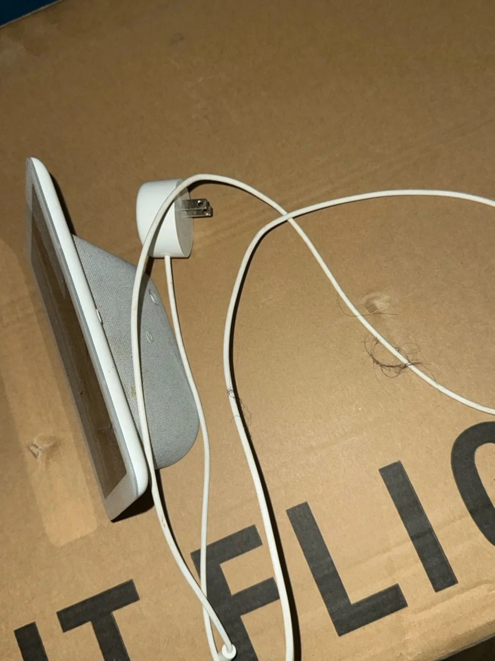 google Nest Hub smart display in white and light gray